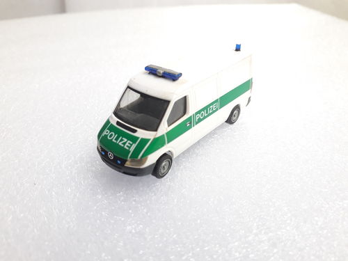 Herpa 046909 Mercedes Benz  Sprinter Polizei Gefangenentransport im Maßstab 1:87 HO